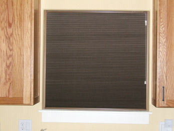 Visible Image of Kitchen Window with Shade Down from Inside